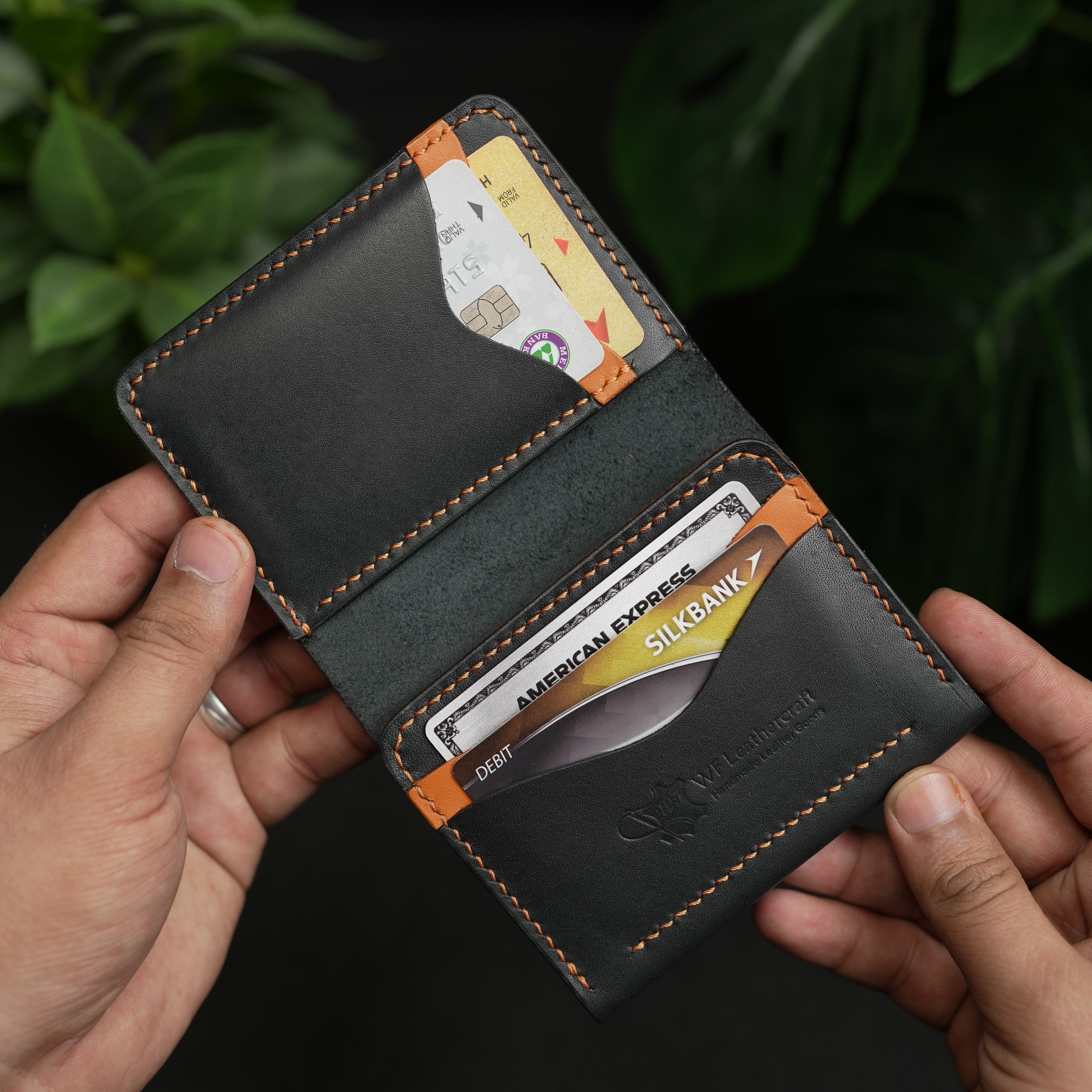 No. 69 vertical bifold wallet Black & Tan color